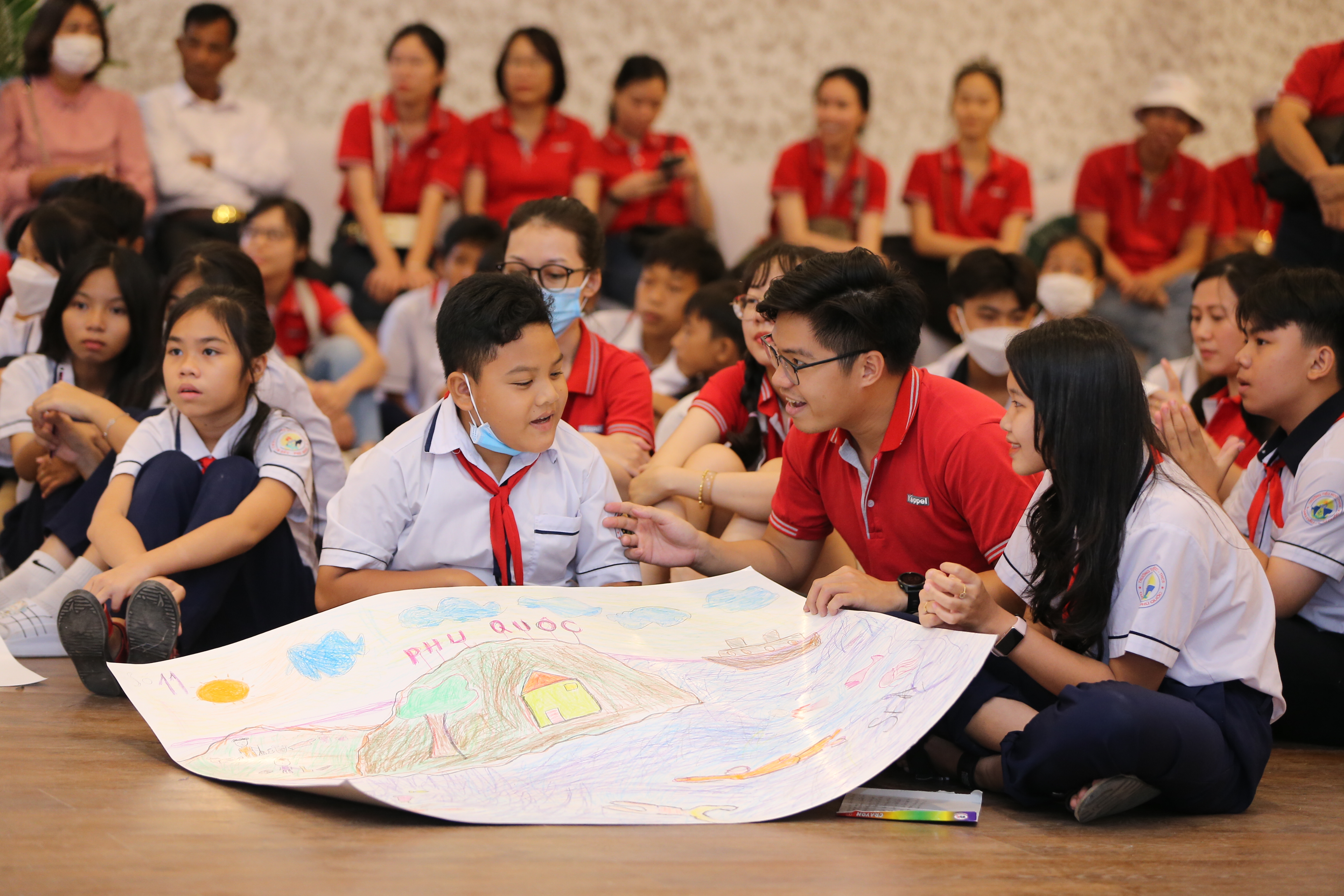Keppel Land volunteers interacting with the students of Ganh Dau Primary and Secondary School.